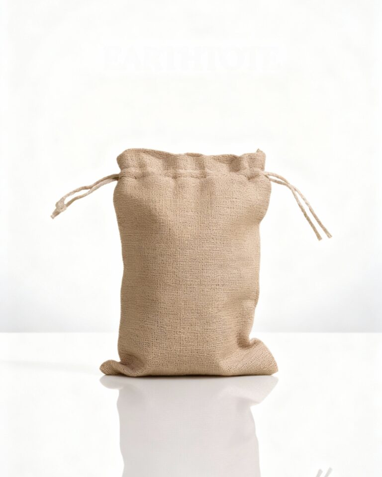 Eco-friendly jewelry tote bag made of natural jute fabric with drawstring closure by Earth Tote – sustainable packaging for UK brands.